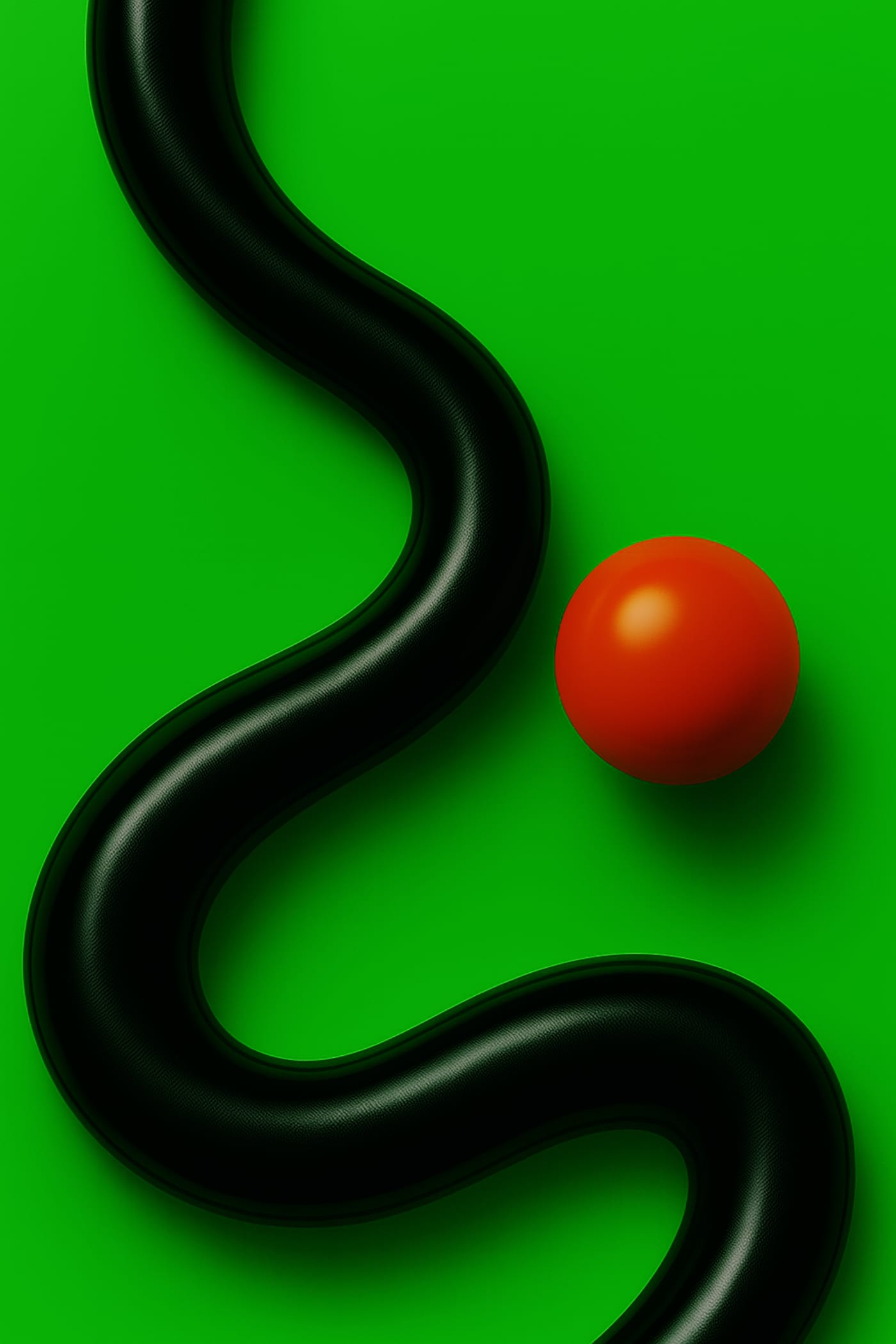 Чёрная змея и красный шарик на зелёном фоне (крупный план)